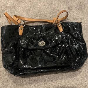 Black shiny with tan straps coach purse